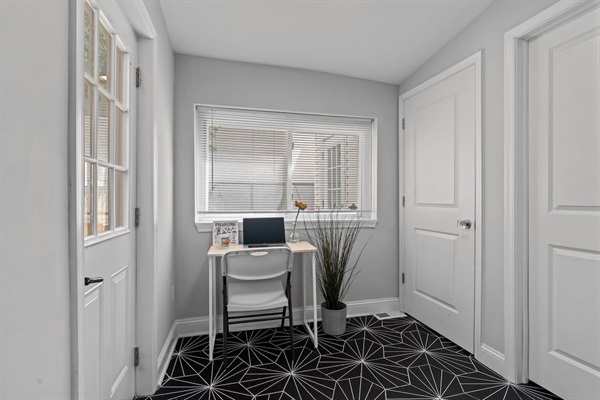 Appreciate the bright and serene workspace, ideal for catching up on emails or planning your day's itinerary. The natural light and minimalist design create a productive and relaxing environment.