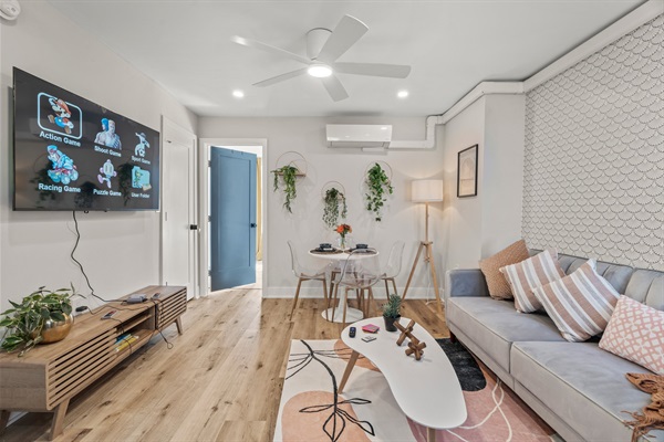 Stream, play, or relax in this bright, open living space filled with modern warmth and charm.